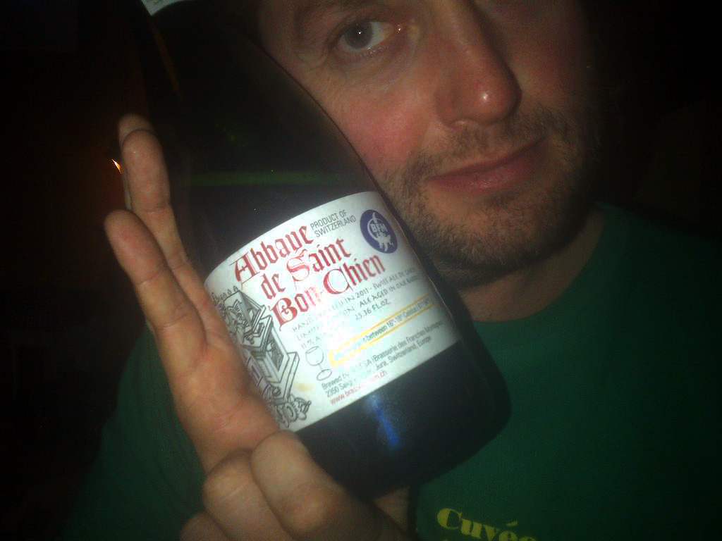 BFM brewer Jérôme Rebetez holding Battle of the Belgians overall winner Abbaye de Saint Bon Chien 2011 at Jimmy's No. 43,...